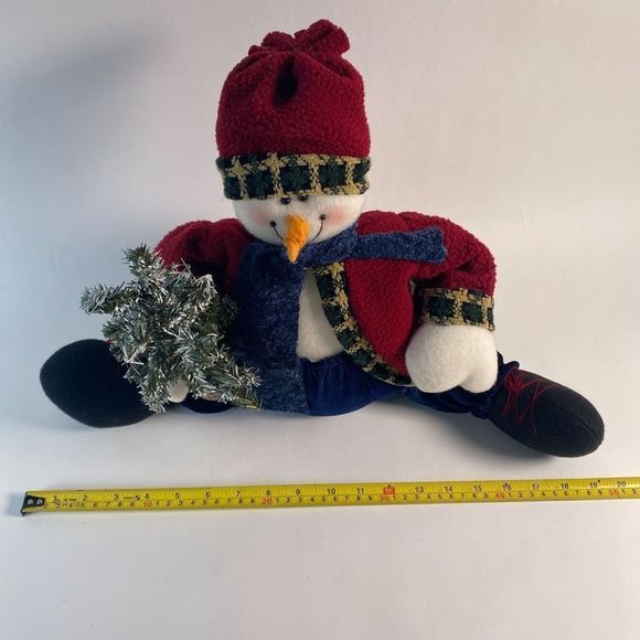 Plush Snowman holding artificial snow flocked tree. - Picture 8 of 9